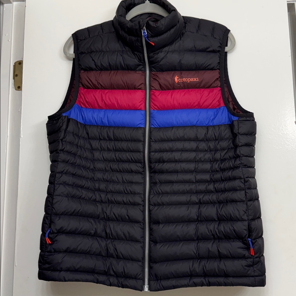 Cotopaxi Black Vest with Red, Blue, and Brown Accents